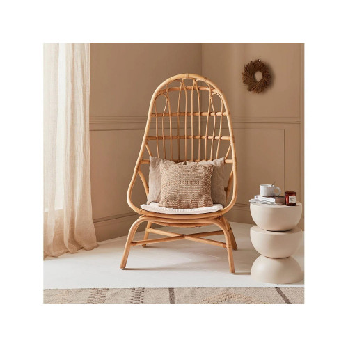 Sillón de ratán en forma de huevo con cojín natural