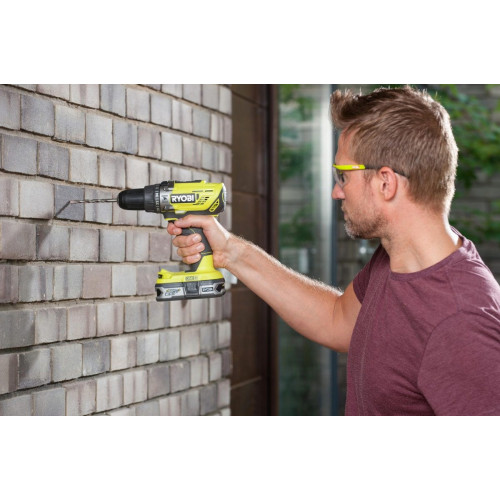 Taladro percutor a batería RYOBI 18V - 2 baterias - 1 punta de atornillar doble, 1 empuñadura auxiliar de la amoladora, 1 llave, 1 protector de disco, 1 disco de amolar - R18PDAG-242S
